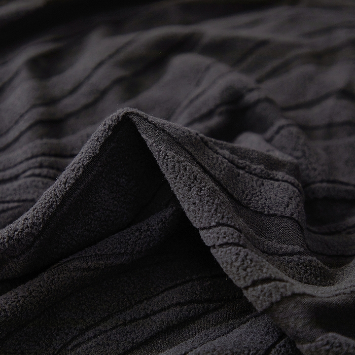 91家纺网 家纺一手货源 找家纺 共鸣沙发套 2025春夏新款水波纹裙摆弹力提花全包万能沙发套单沙发套裙摆款 黑色