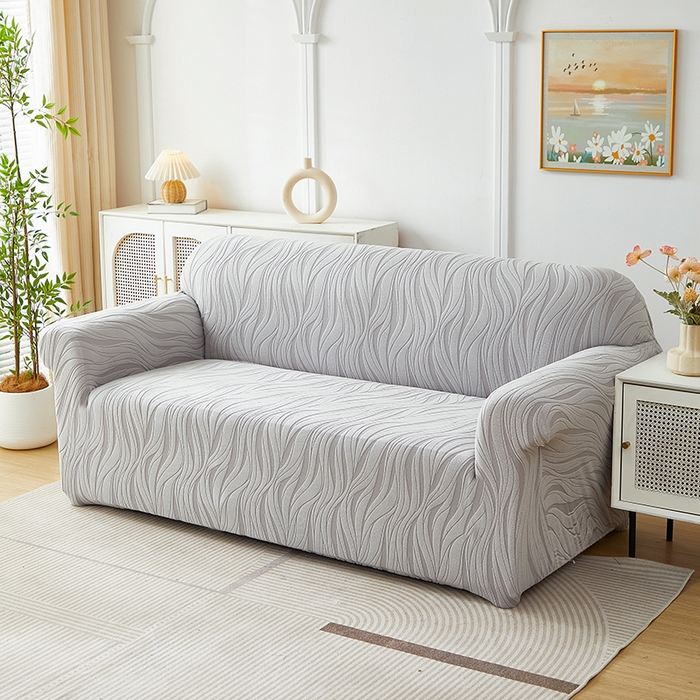 91家纺网 家纺一手货源 找家纺 共鸣沙发套 2025春夏新款水波纹弹力提花全包万能沙发套单沙发套全包款 浅灰色