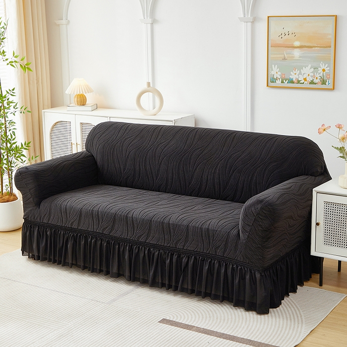 91家纺网 家纺一手货源 找家纺 共鸣沙发套 2025春夏新款水波纹裙摆弹力提花全包万能沙发套单沙发套裙摆款 黑色