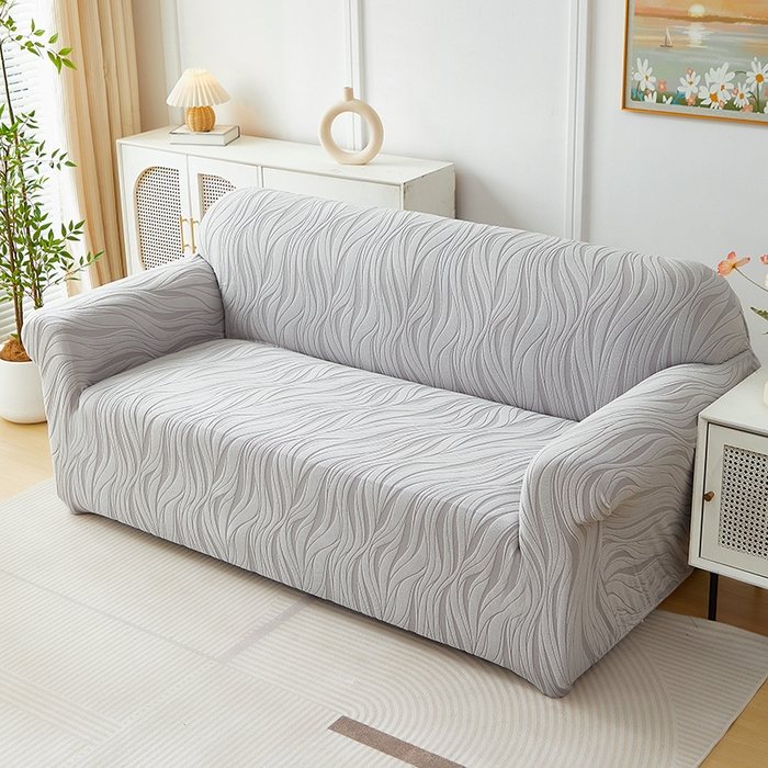 91家纺网 家纺一手货源 找家纺 共鸣沙发套 2025春夏新款水波纹弹力提花全包万能沙发套单沙发套全包款 浅灰色