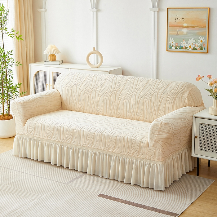 91家纺网 家纺一手货源 找家纺 共鸣沙发套 2025春夏新款水波纹裙摆弹力提花全包万能沙发套单沙发套裙摆款 米黄色