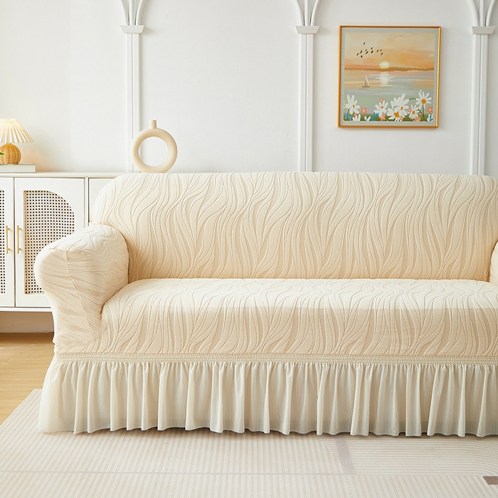 91家纺网 家纺一手货源 找家纺 共鸣沙发套 2025春夏新款水波纹裙摆弹力提花全包万能沙发套单沙发套裙摆款 米黄色