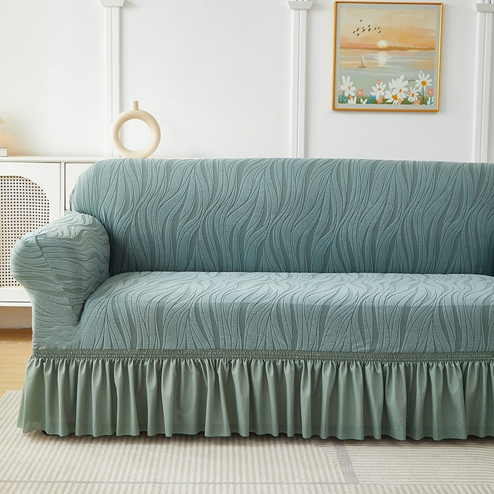 91家纺网 家纺一手货源 找家纺 共鸣沙发套 2025春夏新款水波纹裙摆弹力提花全包万能沙发套单沙发套裙摆款 墨绿色