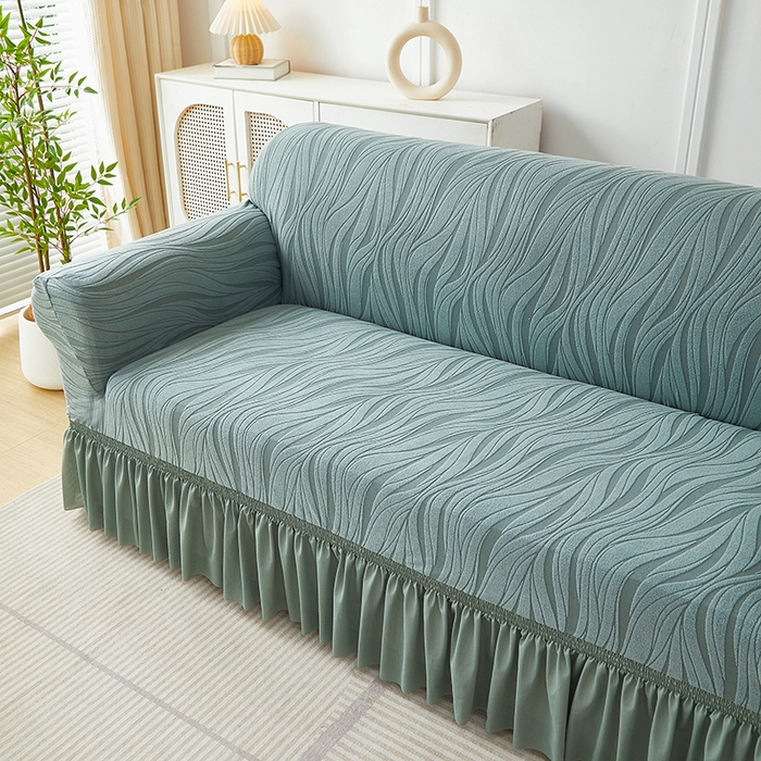 91家纺网 家纺一手货源 找家纺 共鸣沙发套 2025春夏新款水波纹裙摆弹力提花全包万能沙发套单沙发套裙摆款 墨绿色