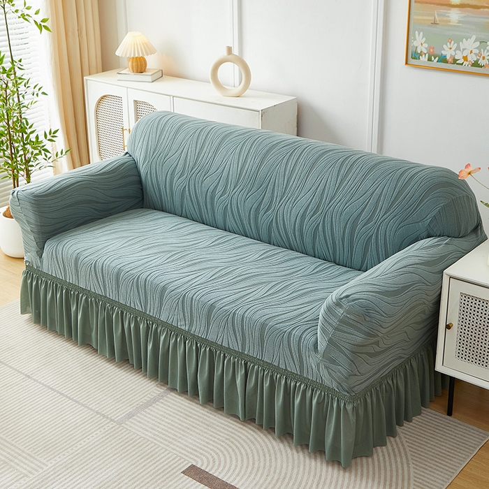 91家纺网 家纺一手货源 找家纺 共鸣沙发套 2025春夏新款水波纹裙摆弹力提花全包万能沙发套单沙发套裙摆款 墨绿色