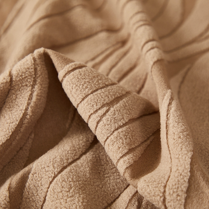 91家纺网 家纺一手货源 找家纺 共鸣沙发套 2025春夏新款水波纹弹力提花全包万能沙发套单沙发套全包款 驼色