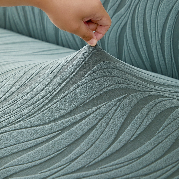 91家纺网 家纺一手货源 找家纺 共鸣沙发套 2025春夏新款水波纹裙摆弹力提花全包万能沙发套单沙发套裙摆款 墨绿色