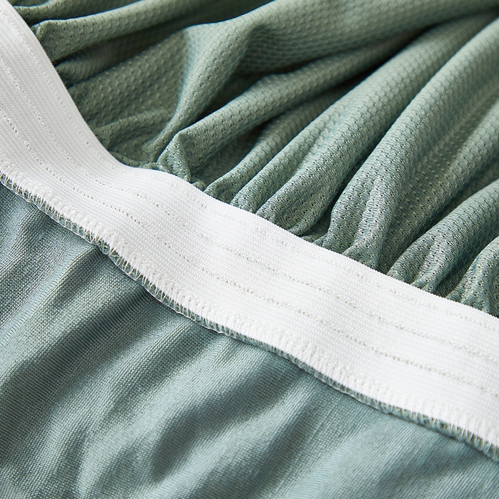 91家纺网 家纺一手货源 找家纺 共鸣沙发套 2025春夏新款水波纹裙摆弹力提花全包万能沙发套单沙发套裙摆款 墨绿色