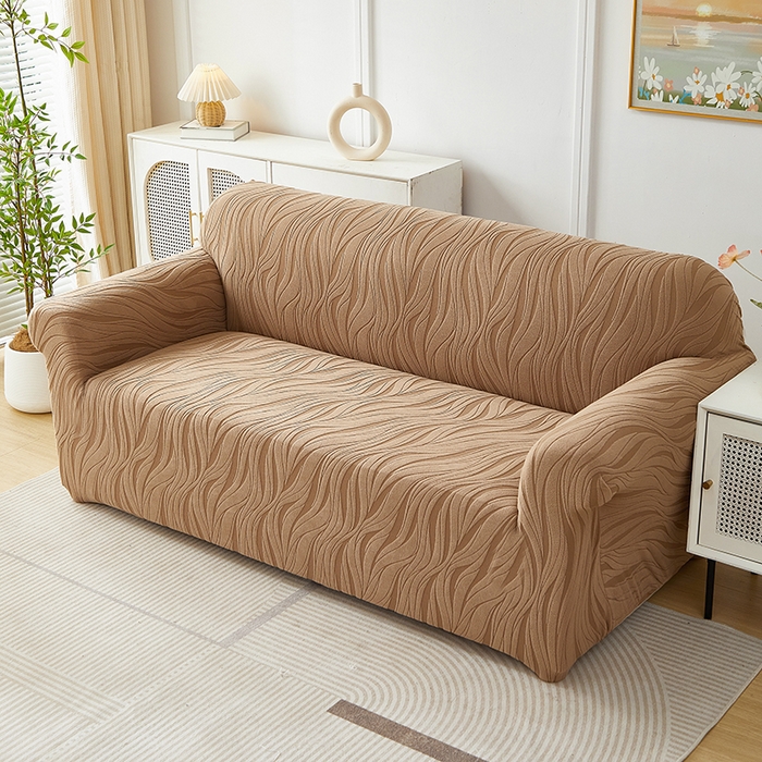 91家纺网 家纺一手货源 找家纺 共鸣沙发套 2025春夏新款水波纹弹力提花全包万能沙发套单沙发套全包款 驼色