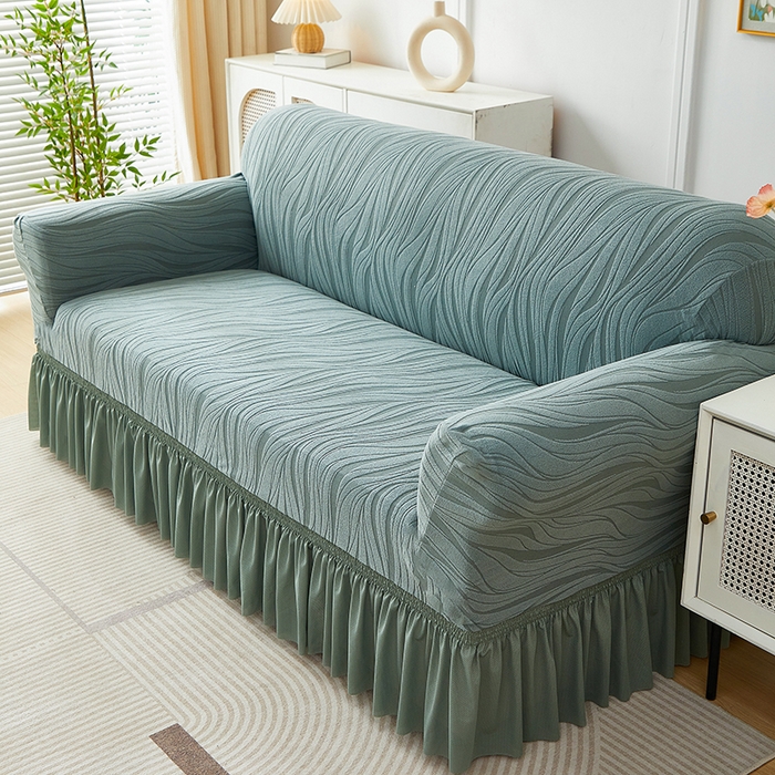 91家纺网 家纺一手货源 找家纺 共鸣沙发套 2025春夏新款水波纹裙摆弹力提花全包万能沙发套单沙发套裙摆款 墨绿色