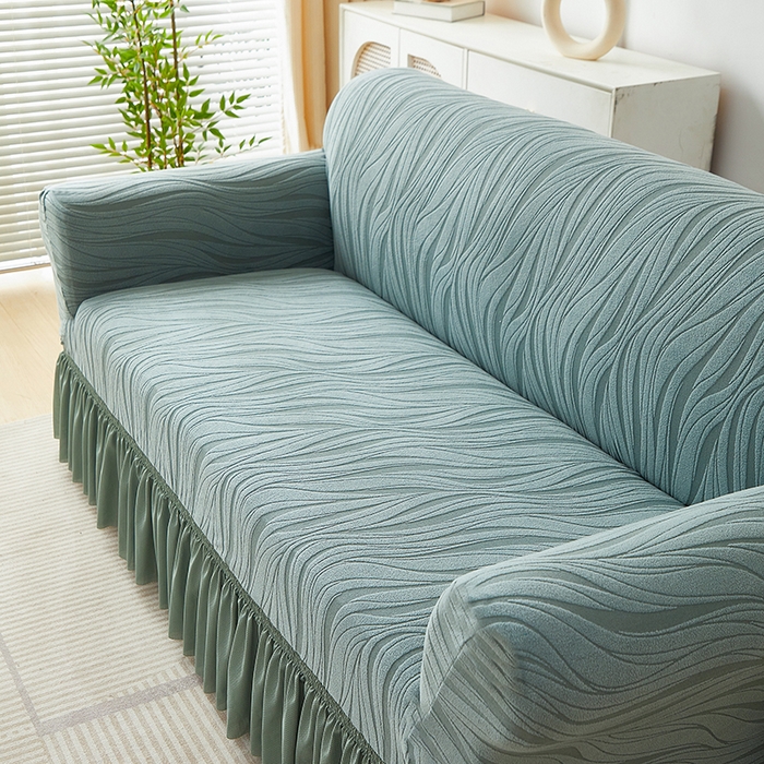 91家纺网 家纺一手货源 找家纺 共鸣沙发套 2025春夏新款水波纹裙摆弹力提花全包万能沙发套单沙发套裙摆款 墨绿色