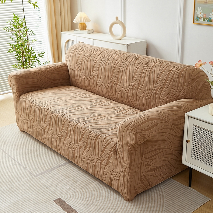 91家纺网 家纺一手货源 找家纺 共鸣沙发套 2025春夏新款水波纹弹力提花全包万能沙发套单沙发套全包款 驼色