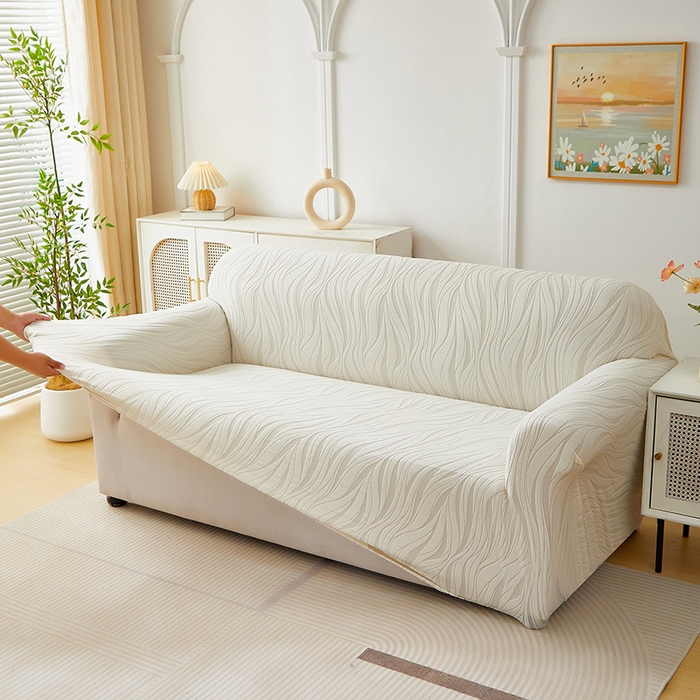 91家纺网 家纺一手货源 找家纺 共鸣沙发套 2025春夏新款水波纹弹力提花全包万能沙发套单沙发套全包款 象牙白