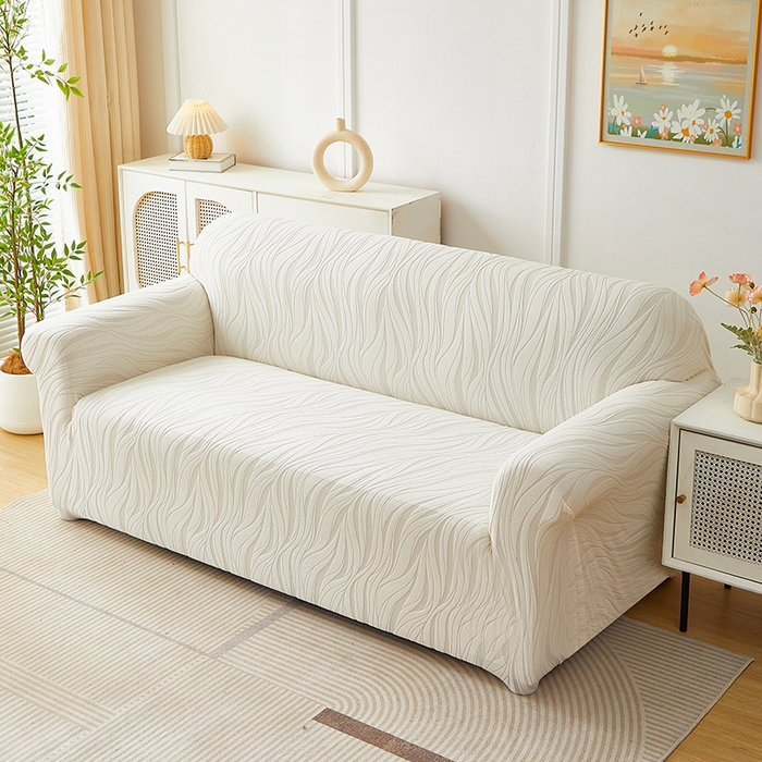 91家纺网 家纺一手货源 找家纺 共鸣沙发套 2025春夏新款水波纹弹力提花全包万能沙发套单沙发套全包款 象牙白