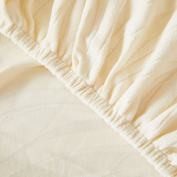 91家纺网 家纺一手货源 找家纺 共鸣沙发套 2025春夏新款水波纹弹力提花全包万能沙发套单沙发套全包款 象牙白