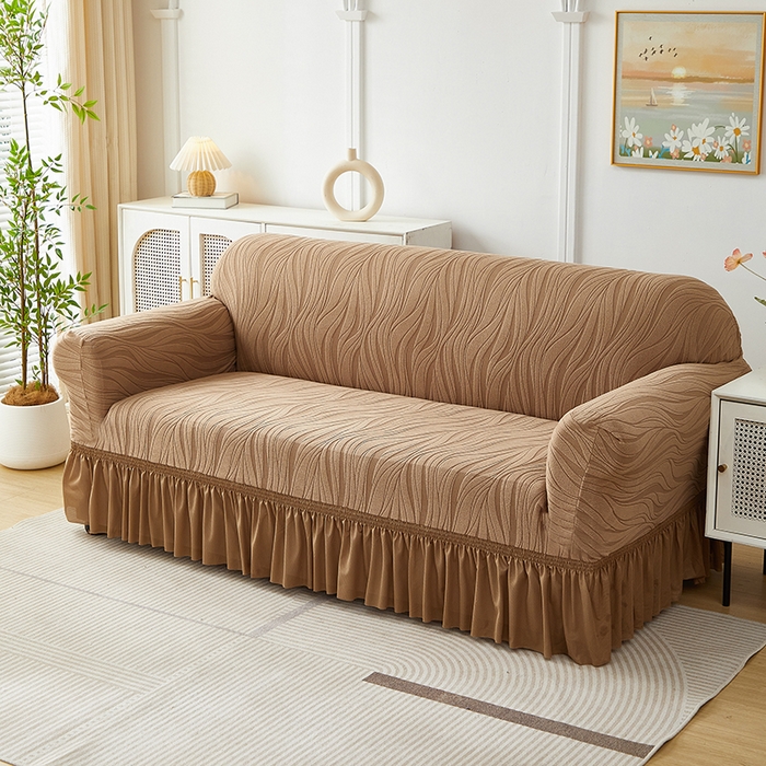 91家纺网 家纺一手货源 找家纺 共鸣沙发套 2025春夏新款水波纹裙摆弹力提花全包万能沙发套单沙发套裙摆款 驼色