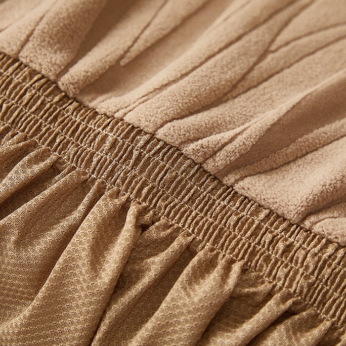 91家纺网 家纺一手货源 找家纺 共鸣沙发套 2025春夏新款水波纹裙摆弹力提花全包万能沙发套单沙发套裙摆款 驼色