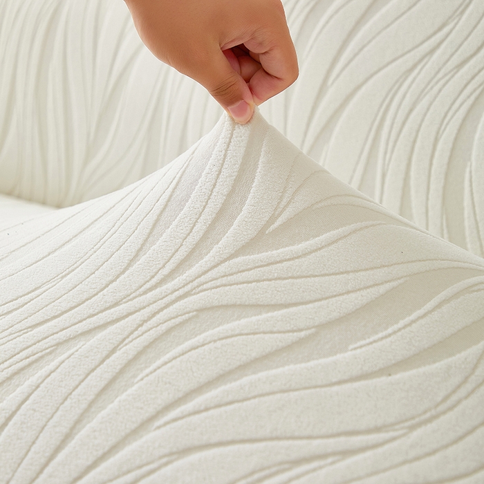 91家纺网 家纺一手货源 找家纺 共鸣沙发套 2025春夏新款水波纹裙摆弹力提花全包万能沙发套单沙发套裙摆款 象牙白