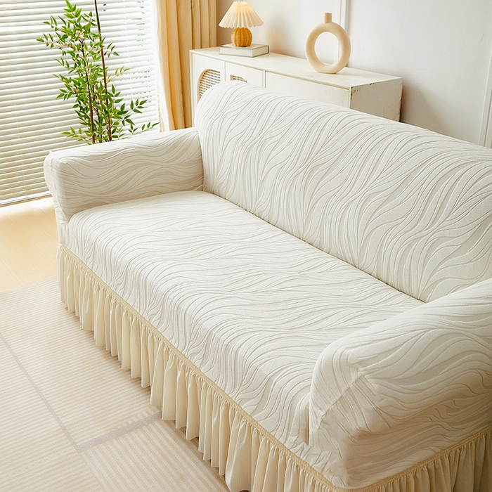 91家纺网 家纺一手货源 找家纺 共鸣沙发套 2025春夏新款水波纹裙摆弹力提花全包万能沙发套单沙发套裙摆款 象牙白