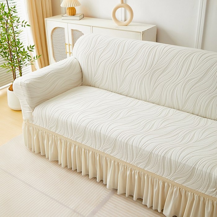 91家纺网 家纺一手货源 找家纺 共鸣沙发套 2025春夏新款水波纹裙摆弹力提花全包万能沙发套单沙发套裙摆款 象牙白