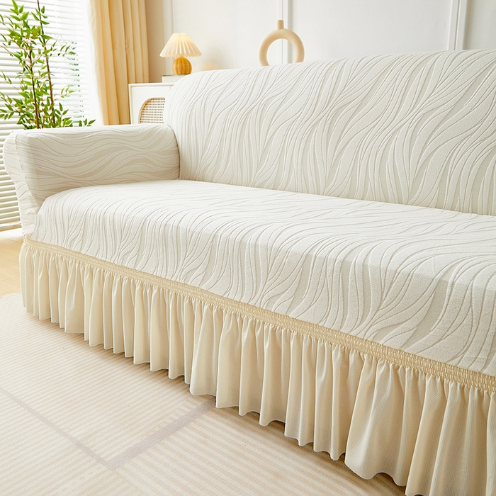 91家纺网 家纺一手货源 找家纺 共鸣沙发套 2025春夏新款水波纹裙摆弹力提花全包万能沙发套单沙发套裙摆款 象牙白