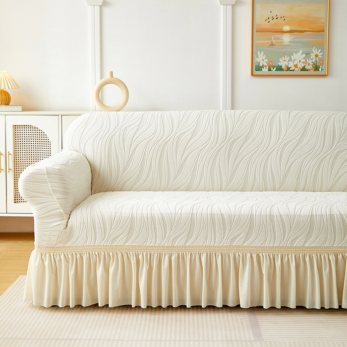 91家纺网 家纺一手货源 找家纺 共鸣沙发套 2025春夏新款水波纹裙摆弹力提花全包万能沙发套单沙发套裙摆款 象牙白