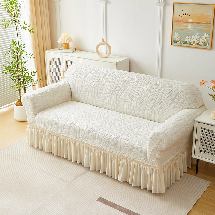 91家纺网 家纺一手货源 找家纺 共鸣沙发套 2025春夏新款水波纹裙摆弹力提花全包万能沙发套单沙发套裙摆款 象牙白