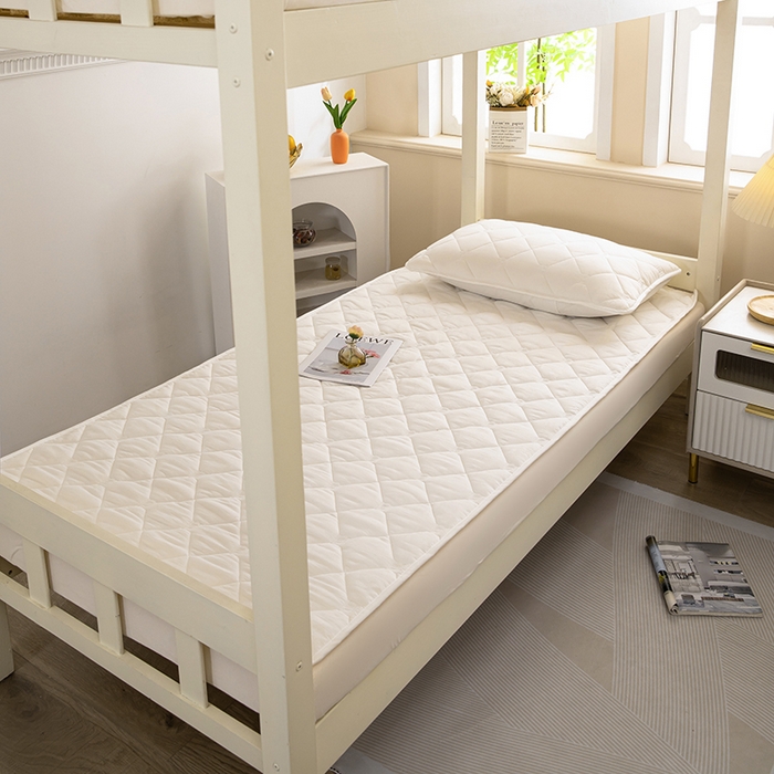 91家纺网 家纺一手货源 找家纺 安逸恋 2025新款A类水洗棉大豆抗菌学生床垫保护垫 米白