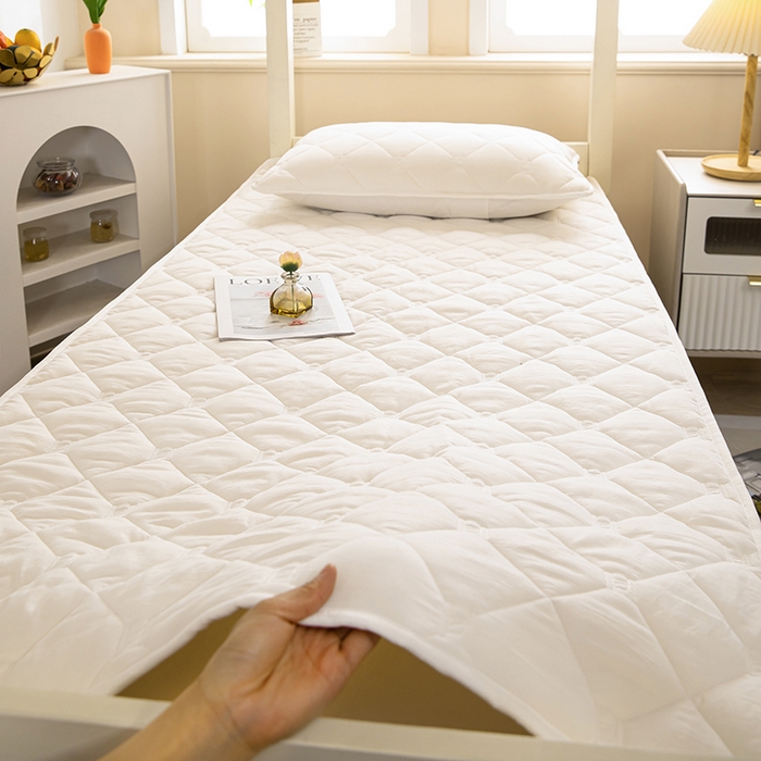 91家纺网 家纺一手货源 找家纺 安逸恋 2025新款A类水洗棉大豆抗菌学生床垫保护垫 米白
