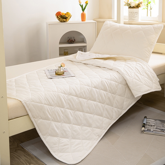 91家纺网 家纺一手货源 找家纺 安逸恋 2025新款A类水洗棉大豆抗菌学生床垫保护垫 米白