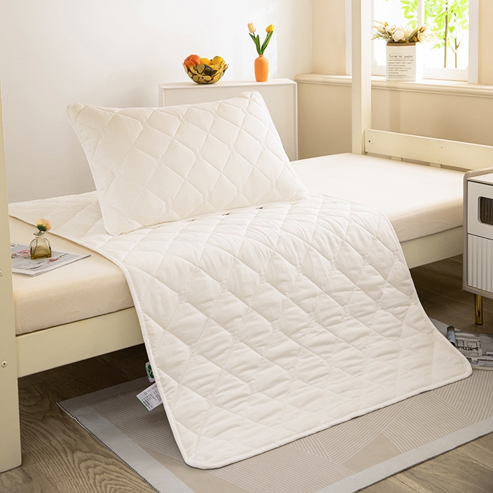 91家纺网 家纺一手货源 找家纺 安逸恋 2025新款A类水洗棉大豆抗菌学生床垫保护垫 米白