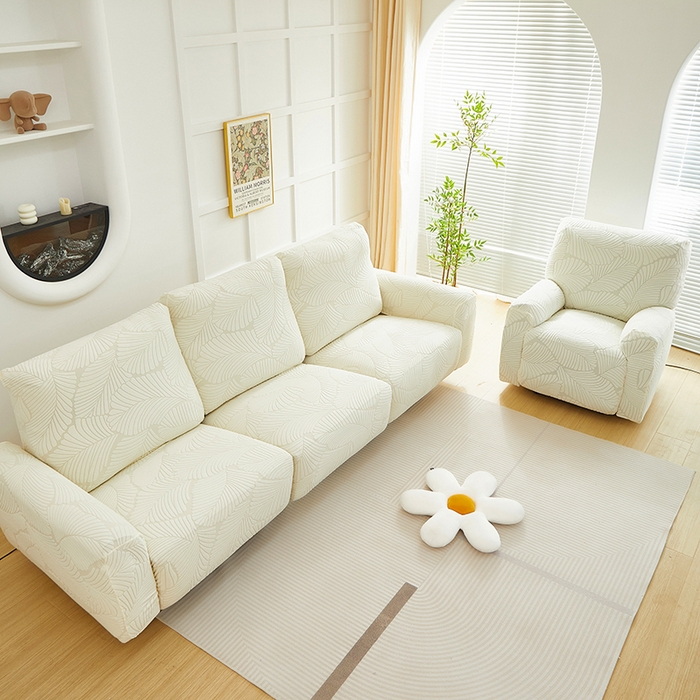 91家纺网 家纺一手货源 找家纺 丝绮鹿 2025新款雕花绒大叶子芝华士沙发套 米白