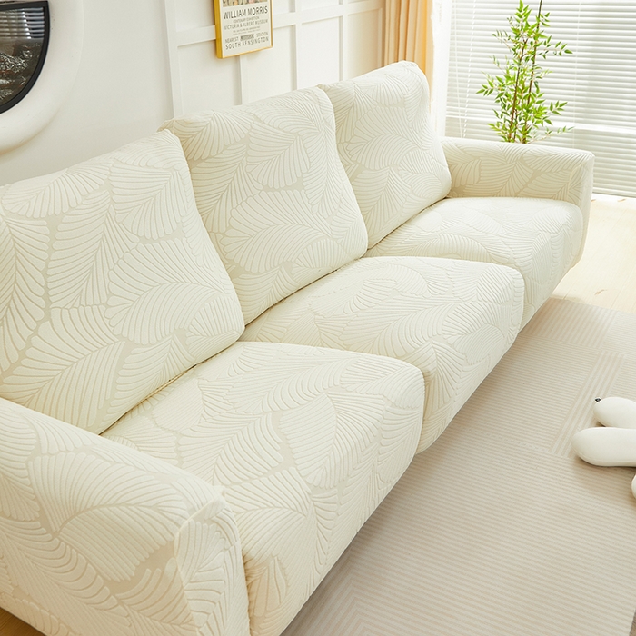 91家纺网 家纺一手货源 找家纺 丝绮鹿 2025新款雕花绒大叶子芝华士沙发套 米白