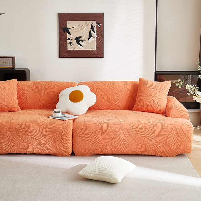 91家纺网 家纺一手货源 找家纺 丝绮鹿 2025新款雕花绒大叶子沙发套松紧款（直排） 橙色