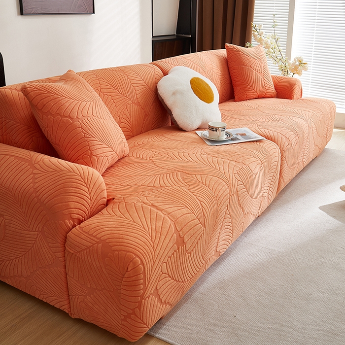 91家纺网 家纺一手货源 找家纺 丝绮鹿 2025新款雕花绒大叶子沙发套松紧款（直排） 橙色