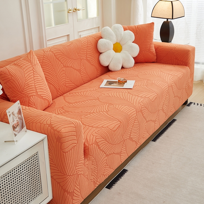 91家纺网 家纺一手货源 找家纺 丝绮鹿 2025新款雕花绒大叶子沙发套松紧款（三人图） 橙色