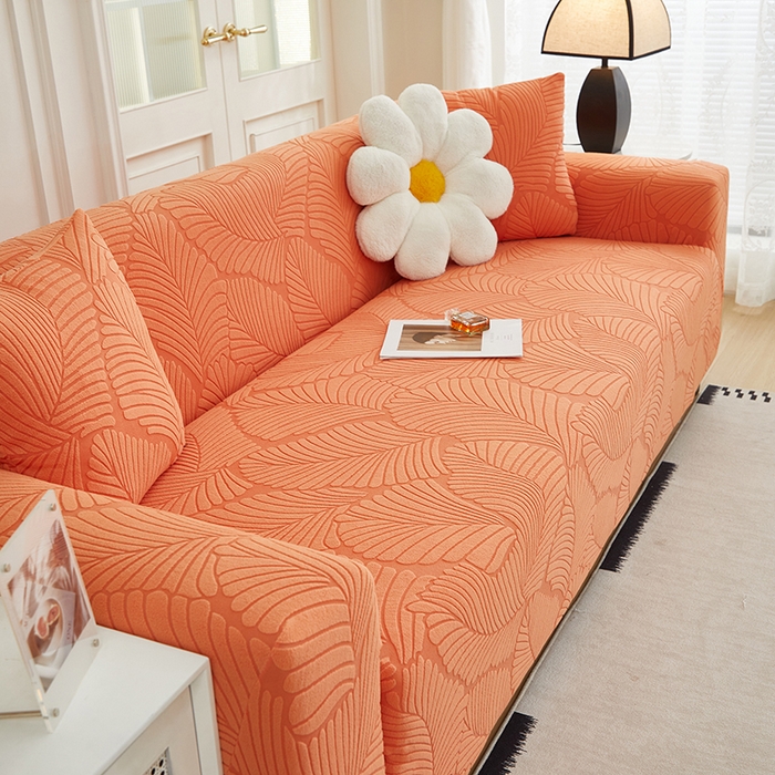 91家纺网 家纺一手货源 找家纺 丝绮鹿 2025新款雕花绒大叶子沙发套松紧款（三人图） 橙色