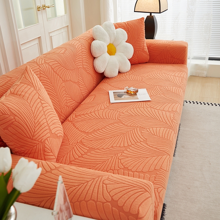 91家纺网 家纺一手货源 找家纺 丝绮鹿 2025新款雕花绒大叶子沙发套松紧款（三人图） 橙色