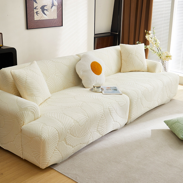 91家纺网 家纺一手货源 找家纺 丝绮鹿 2025新款雕花绒大叶子沙发套松紧款（直排） 米白