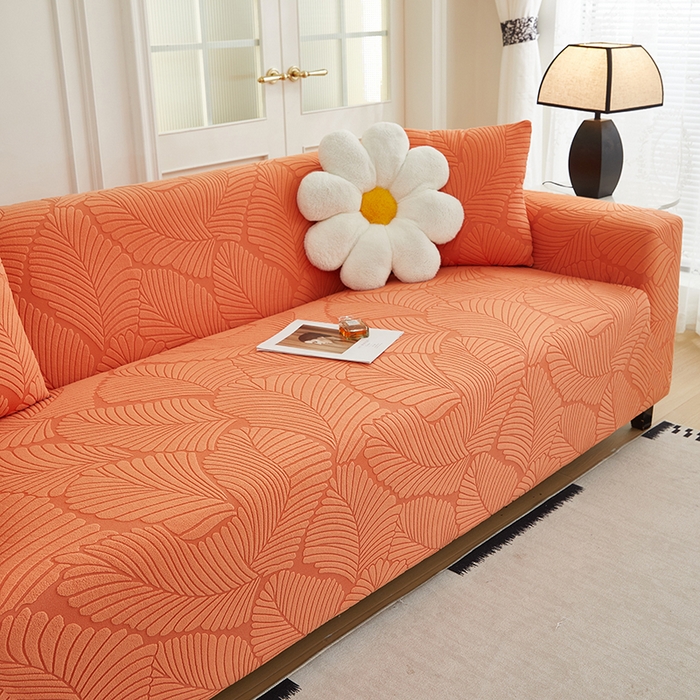 91家纺网 家纺一手货源 找家纺 丝绮鹿 2025新款雕花绒大叶子沙发套松紧款（三人图） 橙色