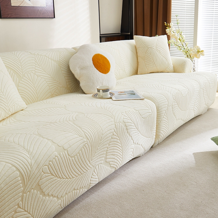 91家纺网 家纺一手货源 找家纺 丝绮鹿 2025新款雕花绒大叶子沙发套松紧款（直排） 米白