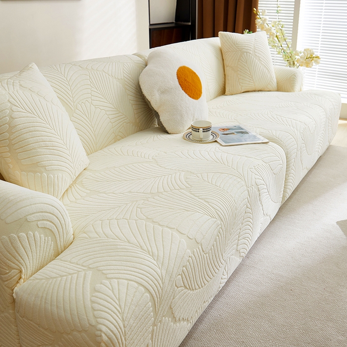 91家纺网 家纺一手货源 找家纺 丝绮鹿 2025新款雕花绒大叶子沙发套松紧款（直排） 米白