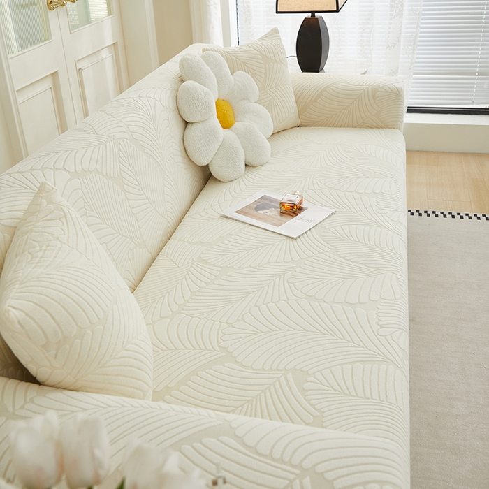 91家纺网 家纺一手货源 找家纺 丝绮鹿 2025新款雕花绒大叶子沙发套松紧款（三人图） 米白