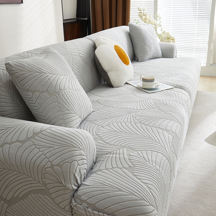91家纺网 家纺一手货源 找家纺 丝绮鹿 2025新款雕花绒大叶子沙发套松紧款（直排） 浅灰