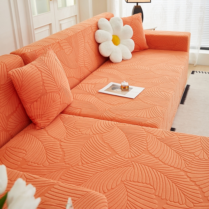 91家纺网 家纺一手货源 找家纺 丝绮鹿 2025新款雕花绒大叶子沙发套松紧款（贵妃图新） 橙色