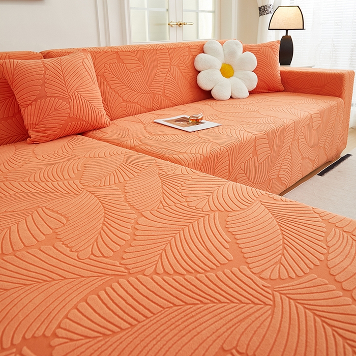 91家纺网 家纺一手货源 找家纺 丝绮鹿 2025新款雕花绒大叶子沙发套松紧款（贵妃图新） 橙色