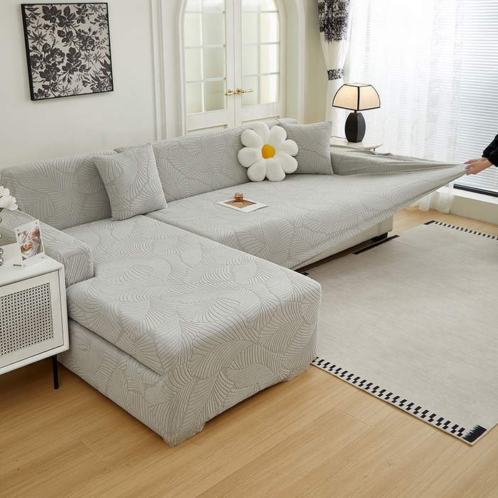 91家纺网 家纺一手货源 找家纺 丝绮鹿 2025新款雕花绒大叶子沙发套松紧款（贵妃图新） 浅灰