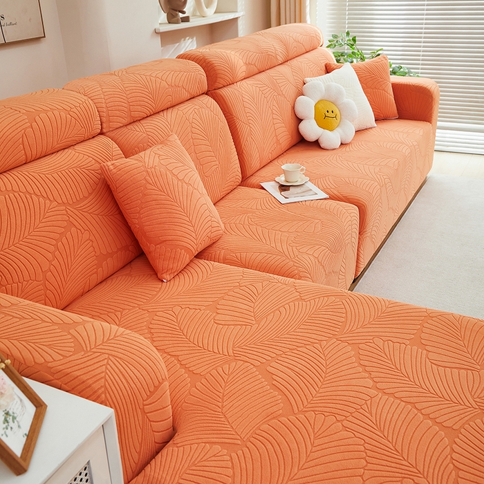91家纺网 家纺一手货源 找家纺 丝绮鹿 2025新款雕花绒大叶子沙发套松紧款（贵妃图） 橙色
