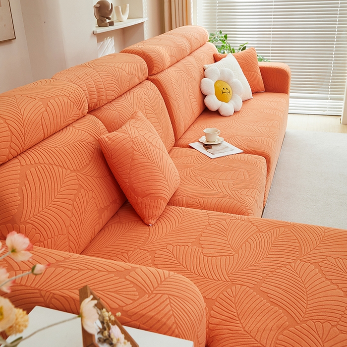 91家纺网 家纺一手货源 找家纺 丝绮鹿 2025新款雕花绒大叶子沙发套松紧款（贵妃图） 橙色
