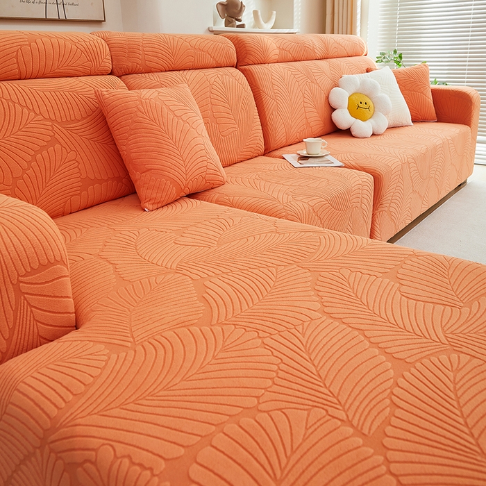 91家纺网 家纺一手货源 找家纺 丝绮鹿 2025新款雕花绒大叶子沙发套松紧款（贵妃图） 橙色
